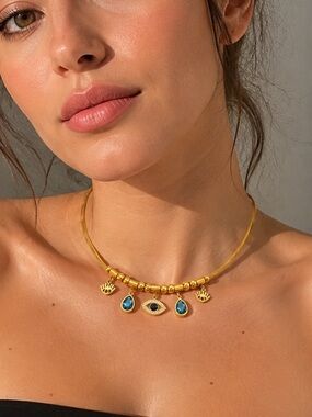Gold multiple charm necklace